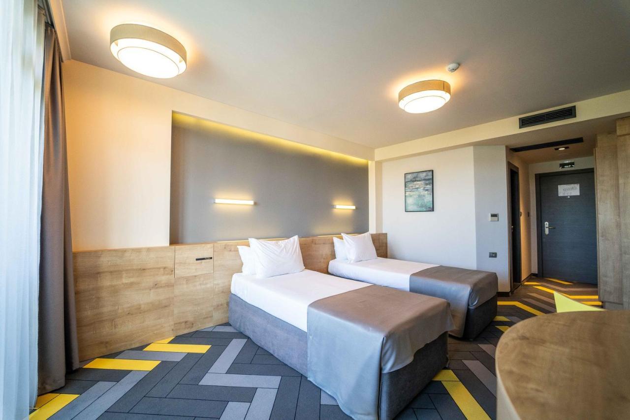 Dvoulůžkový pokoj Promo s oddělenými postelemi (2 dospělí a 1 dítě) - bezplatný minibar a parkování