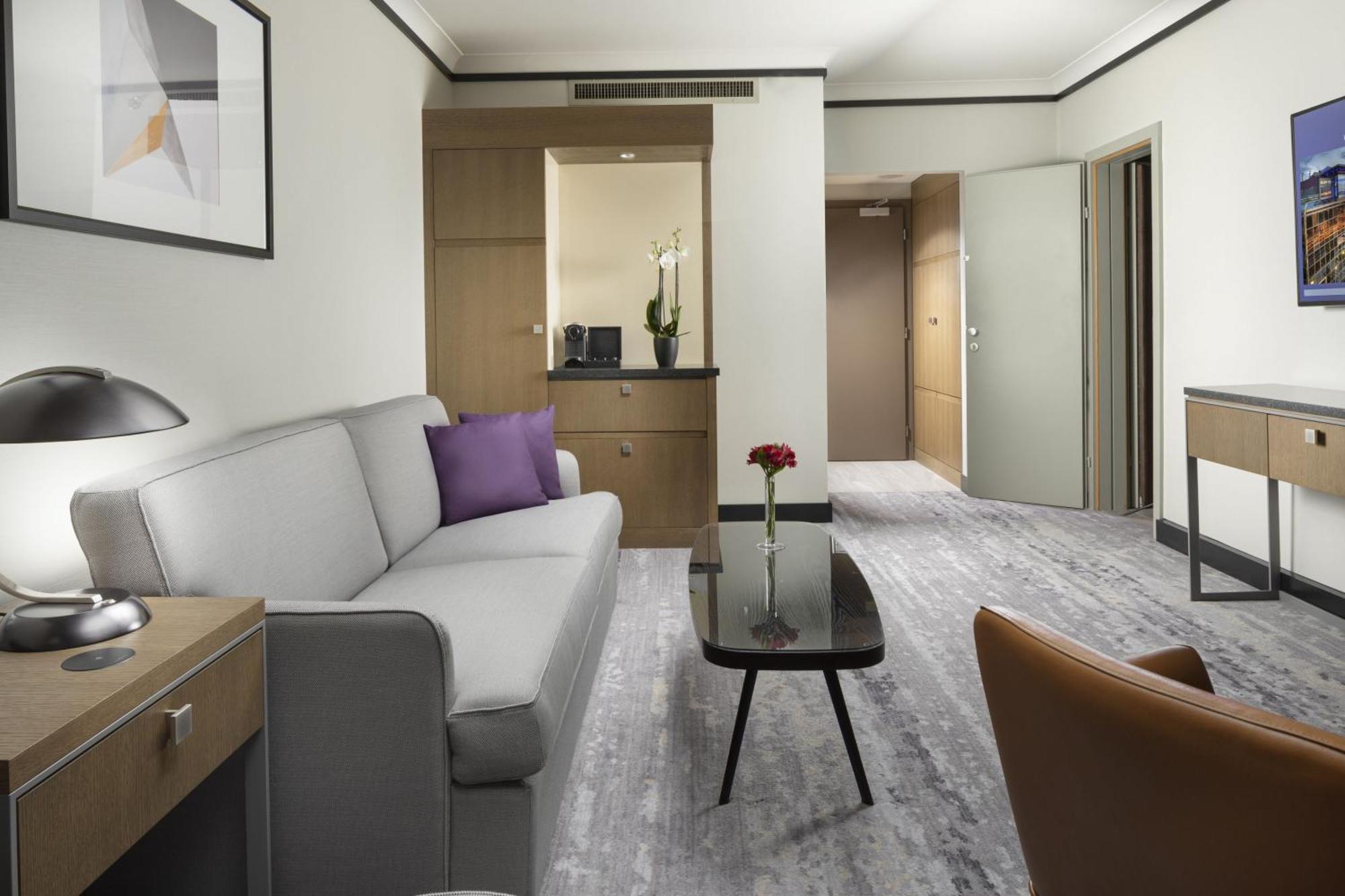 Apartmá typu Executive s manželskou postelí velikosti King.