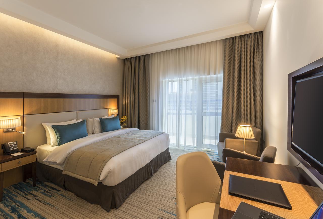 Pokoj Deluxe s manželskou postelí King (bezplatná doprava na pláž a do vybraných nákupních center a 20% sleva na jídlo a nápoje a wellness)