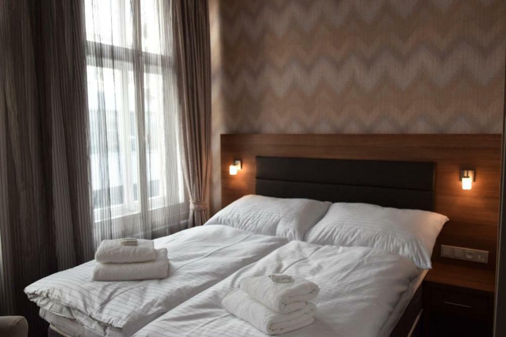 Dvoulůžkový pokoj Economy s manželskou postelí