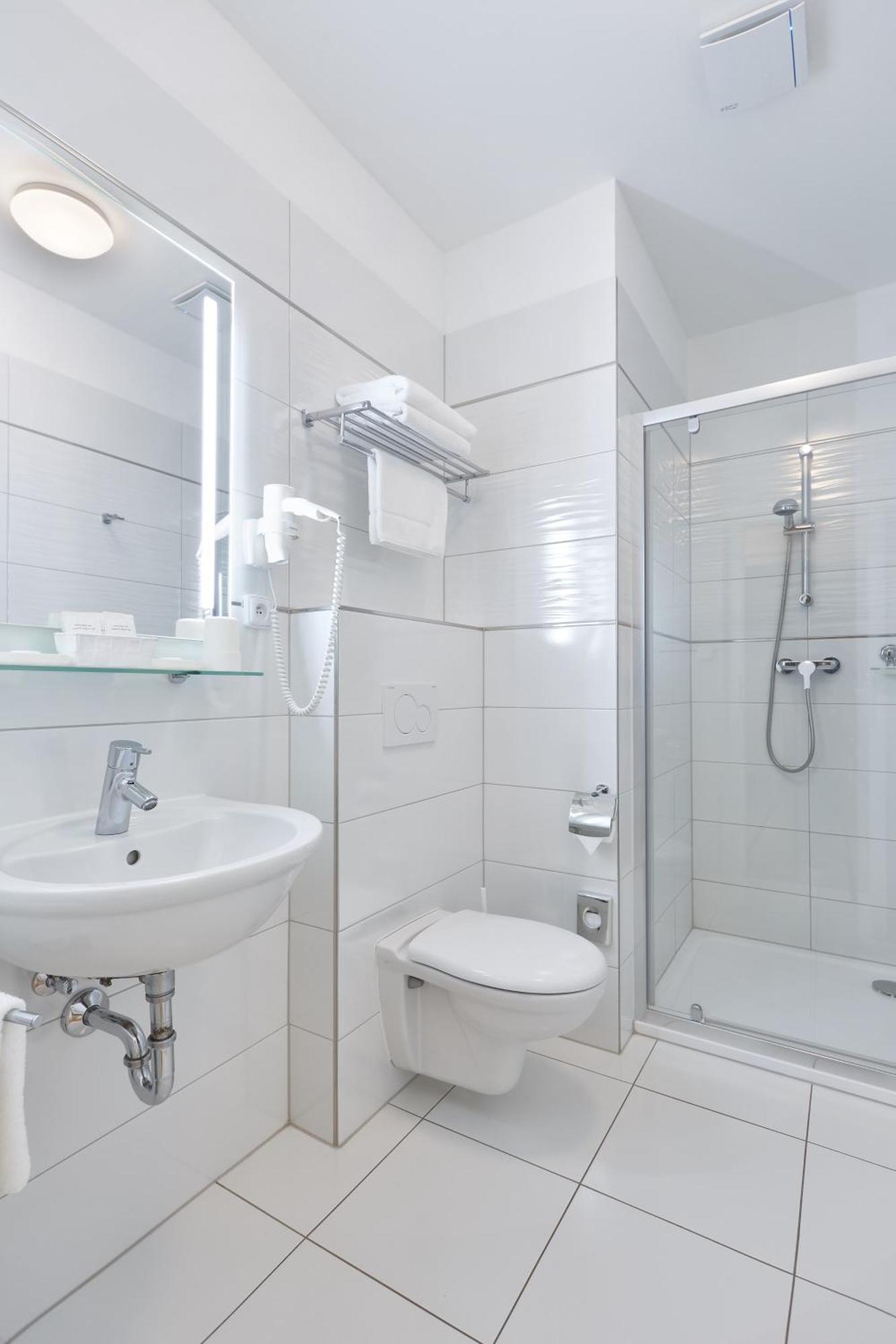 Dvoulůžkový pokoj Comfort s manželskou postelí